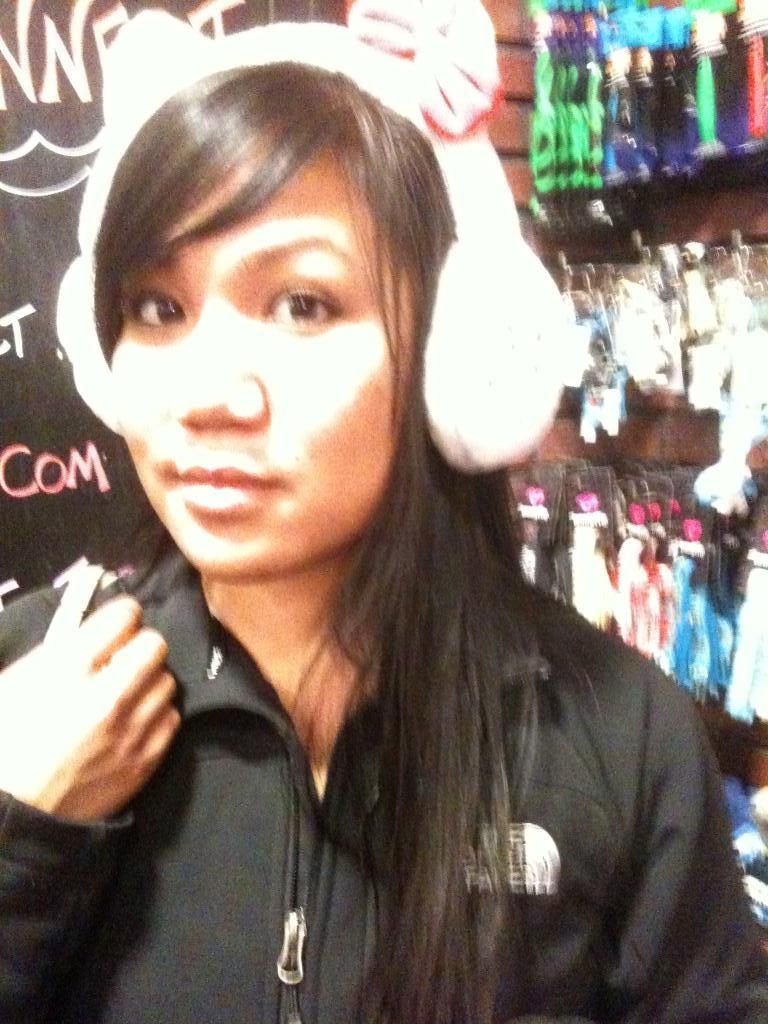 Seester trying on earmuffs for snowboarding Seester trying on earmuffs for snowboarding